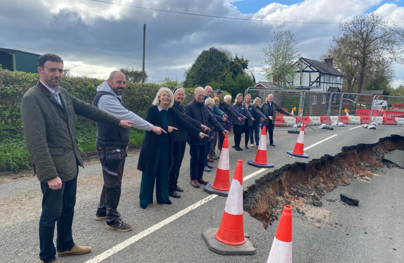Dame Harriett Baldwin MP (third from left) visiting the site of the B4204 road closure in Rochford