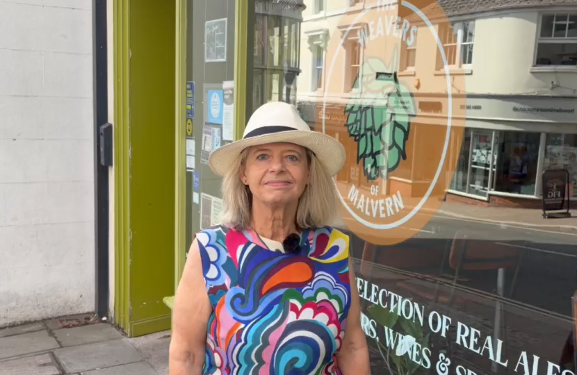 Dame Harriett Baldwin MP outside Weavers on Church Street