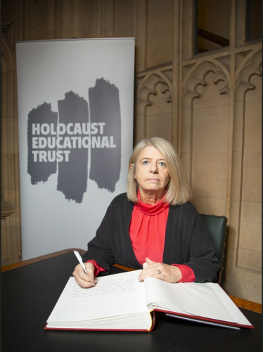 Harriett Baldwin signs the Book of Commitment