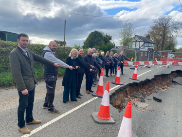 Dame Harriett Baldwin MP (third from left) visiting the site of the B4204 road closure in Rochford