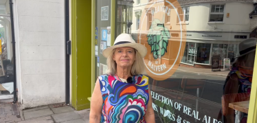 Dame Harriett Baldwin MP outside Weavers on Church Street